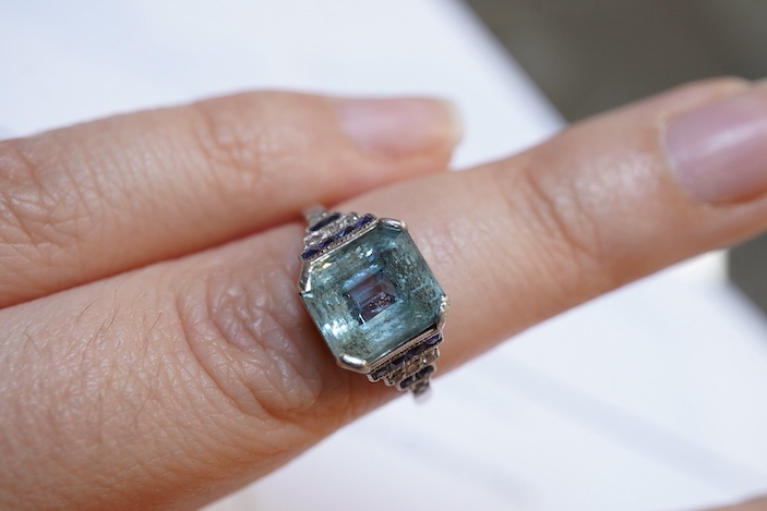 An aquamarine, sapphire and diamond ring